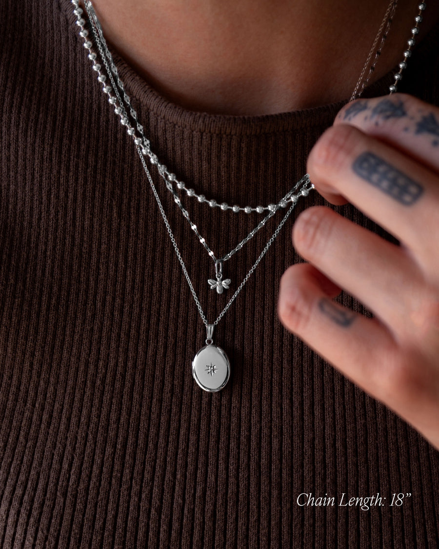 Diamond Starburst Oval Locket - Silver